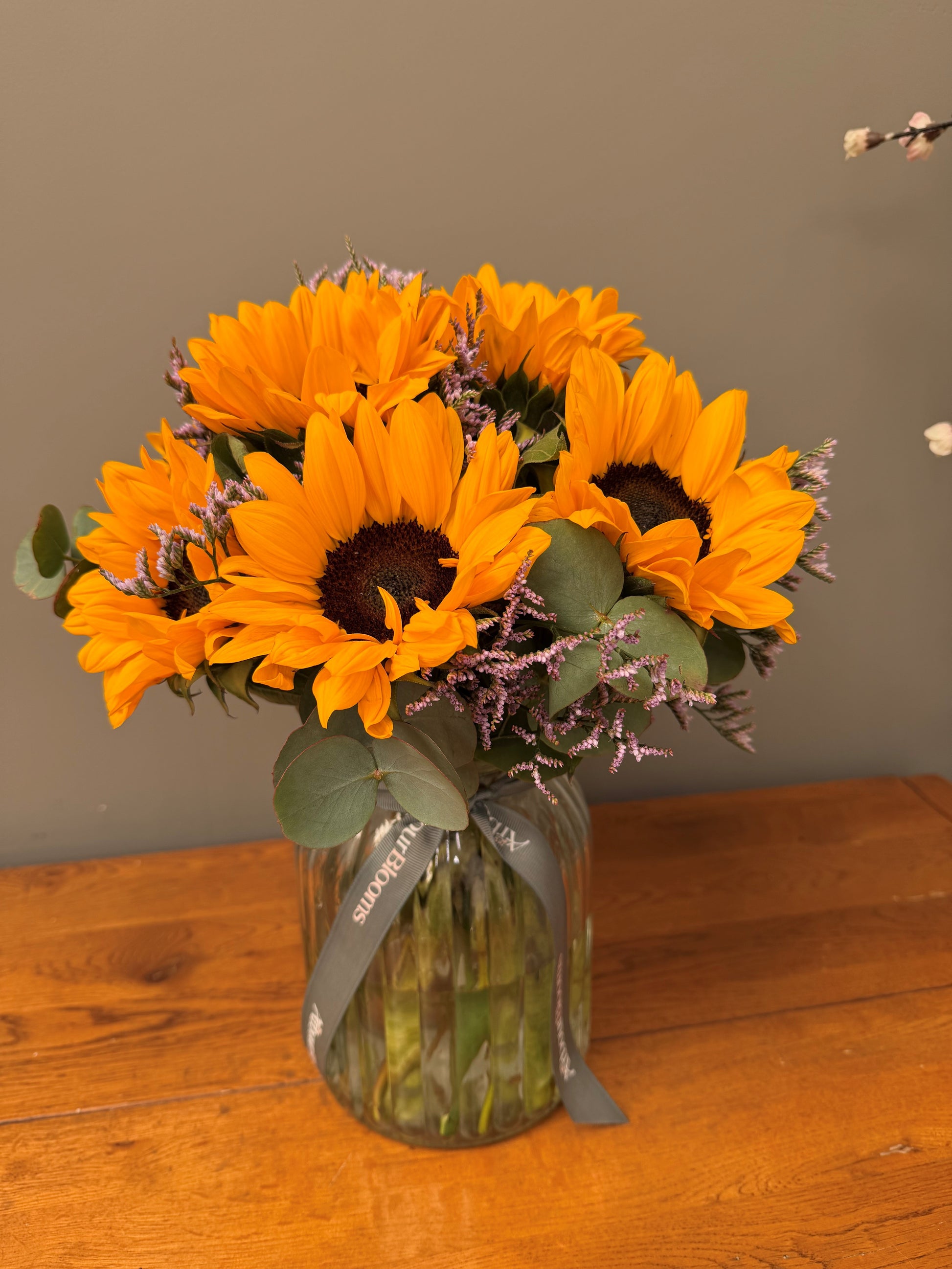 Summer Sunshine Vase — sunflower bouquet with eucalyptus and limonium by Arbour Blooms, Dublin florist