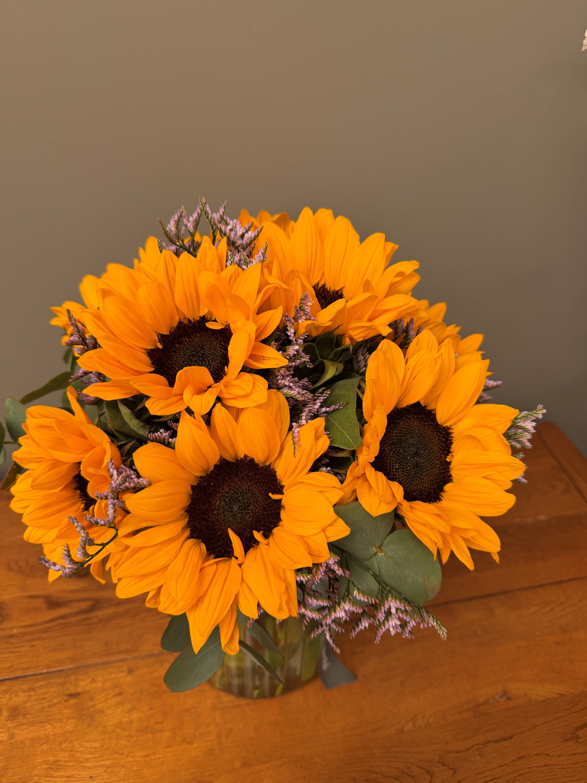 Summer Sunshine Vase — sunflower bouquet with eucalyptus and limonium by Arbour Blooms, Dublin florist